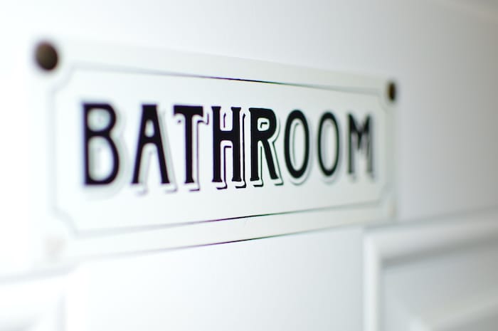 bathroom sign on door