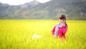 Woman in field on during holiday