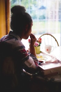 girl eating breakfast and addressing Bulimia and Cardiovascular Risk