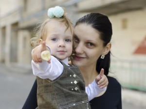 a mother and child fighting for Insurance Coverage