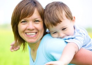 Mother is playing with her son