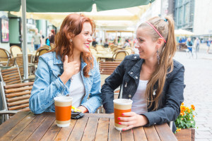 Teenage Girls Drinking at Bar