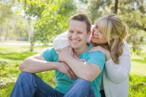 Young Attractive Loving Couple Hugging in the Park.