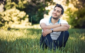 Guy sitting in grass