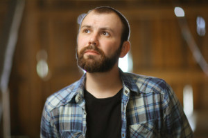 portrait of a bearded man in a rustic style