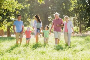 Multi-Generation Family Enjoying Walk In Beautiful Countryside