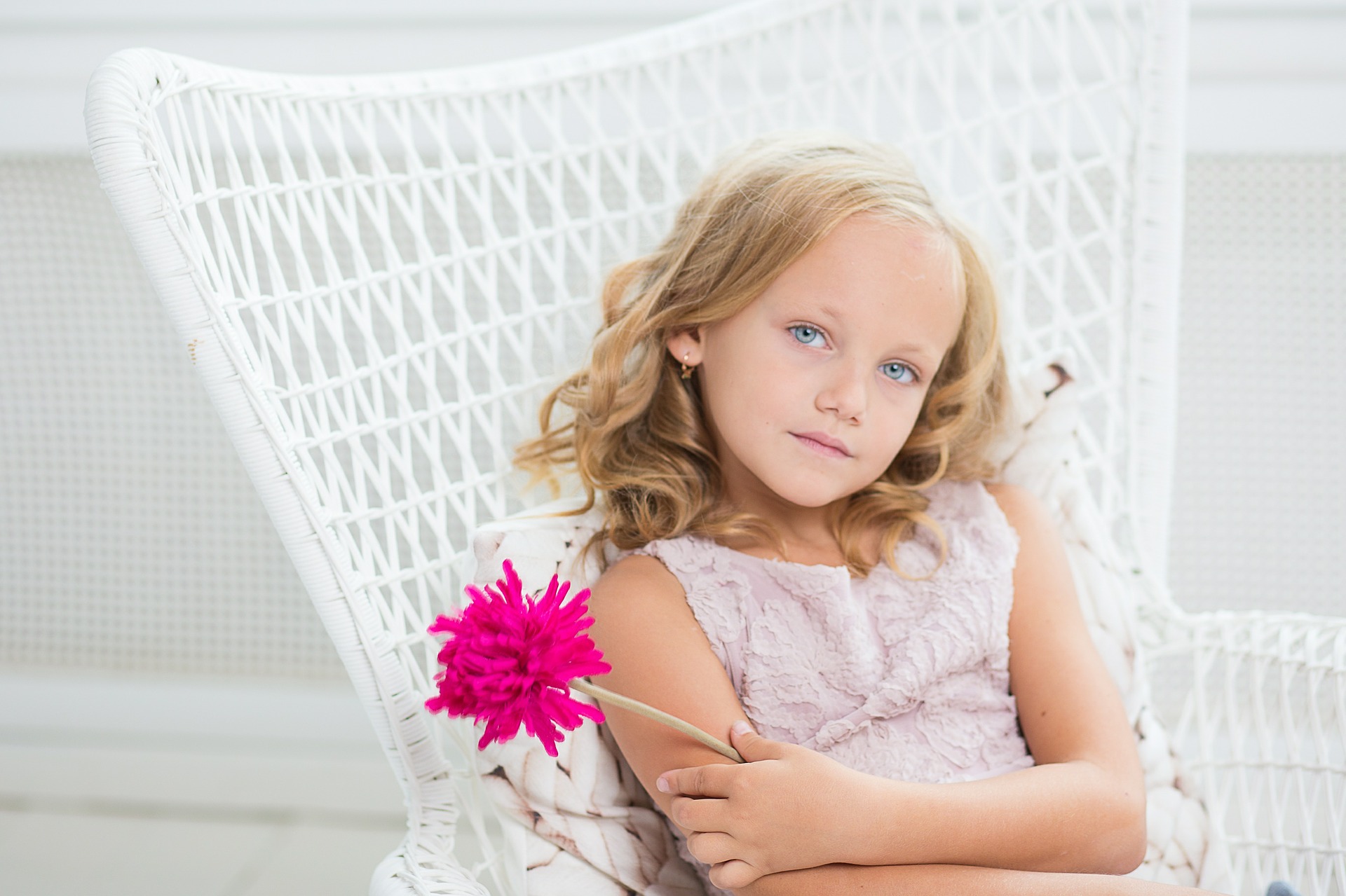 Young Girl holding a flower