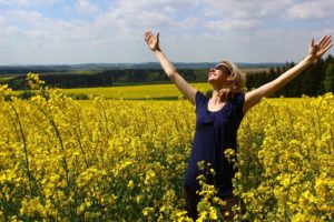 Lady in wheat field fighting OSFED