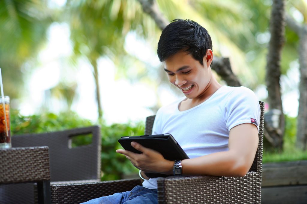 Man researching exposure-based therapy on his iPad