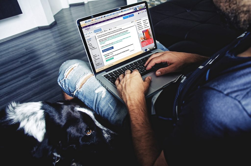 Man using social media on his computer