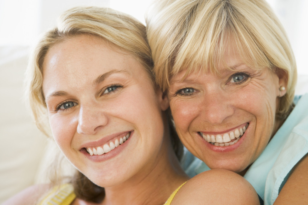 Mother hugging her daughter while visiting her in eating disorder treatment