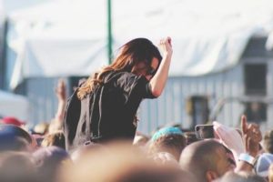 Woman enjoying herself at a music festival