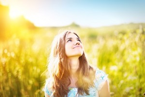 Woman smiling about recovery after treatment