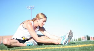 Woman stretching before exercise