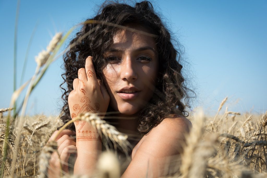 Woman with anorexia in the wheat